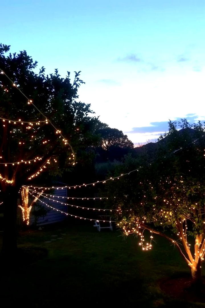 Charming String Lights Ambiance - 22 Cheap Backyard Makeover Ideas