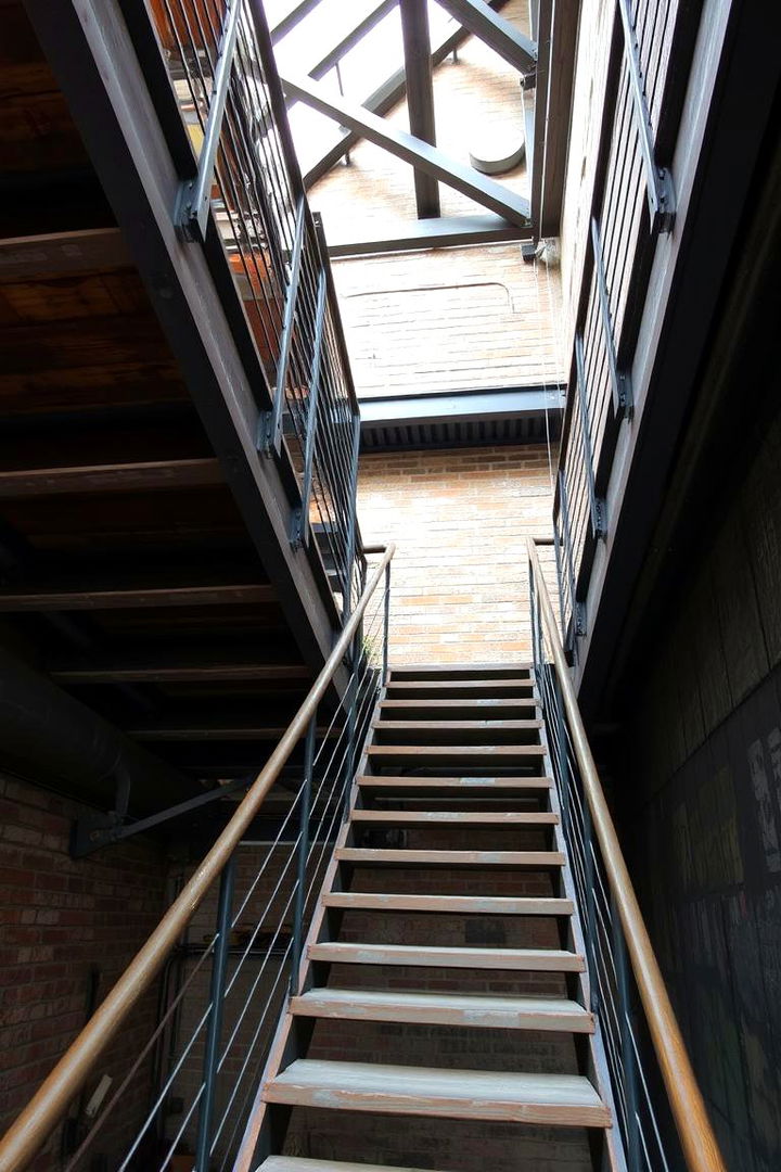 Industrial Chic Staircase with Bold Elements - 22 Basement Stair Ideas
