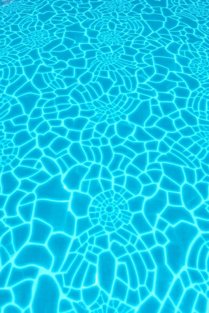Patterned Symphony Designs - 22 Waterline Pool Tile Ideas