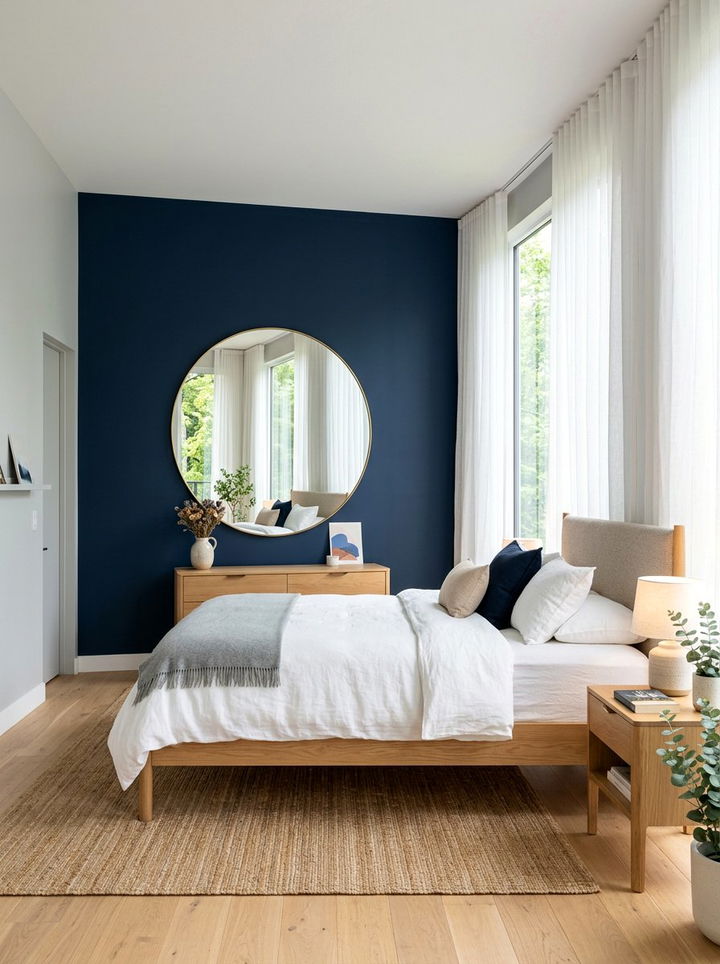 Round Mirror Navy Accent Wall - 30 scandinavian navy bedroom ideas