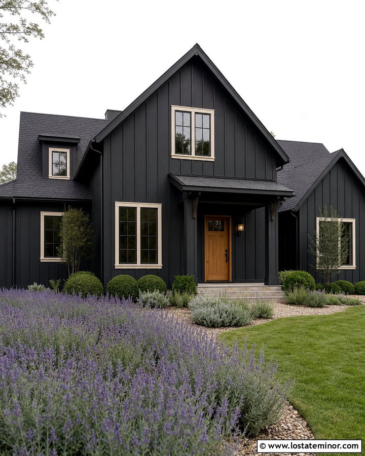 Black Board And Batten House With Lavender - 30 Black House Design With Landscaping Ideas