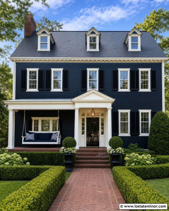 Black Colonial House With Classic Hanging Swing - 30 Black House Design With Swing Ideas
