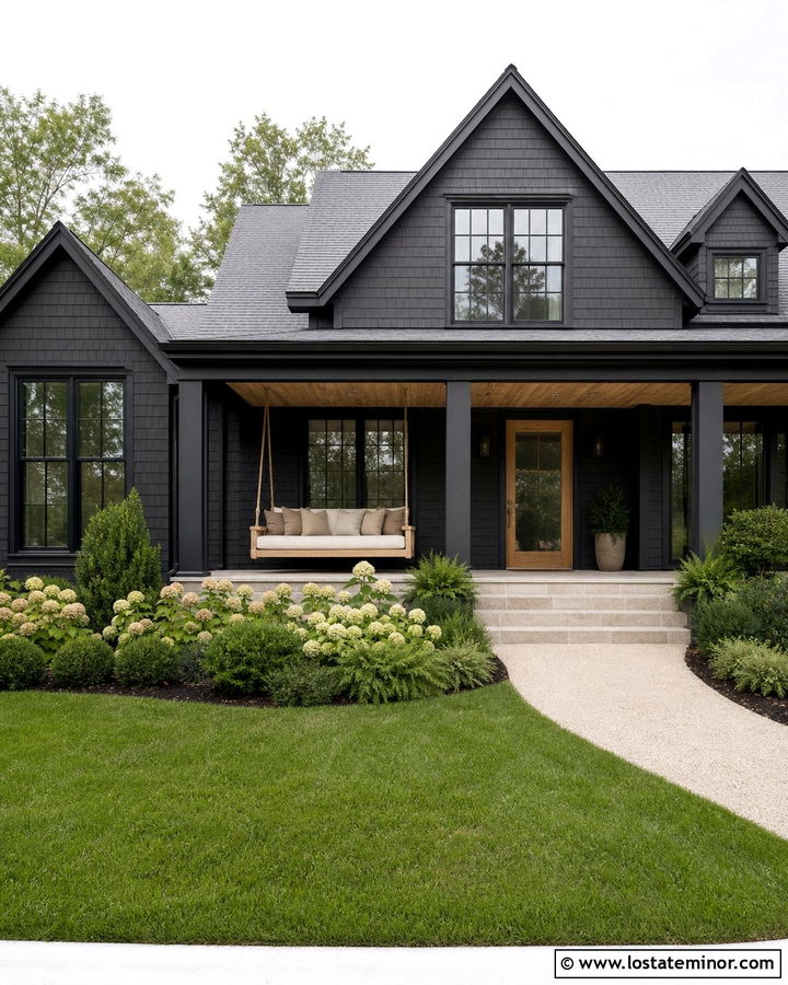 Black Shingle House With Cream Daybed Swing - 30 Black House Design With Swing Ideas