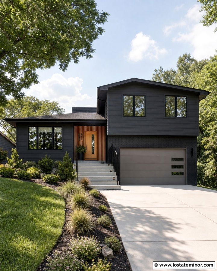 Black Split Level House With Gray Garage Door - 30 Black House Design With Garage Door Ideas