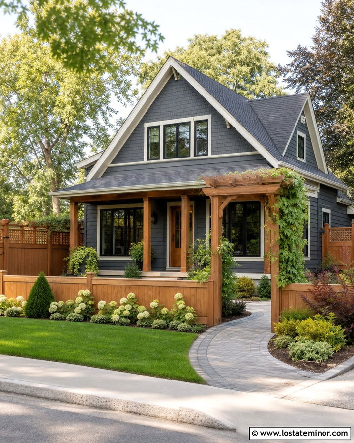Charcoal Grey House With Mixed Height Fence And Arbor - 30 Charcoal Grey House Design With Fence Ideas