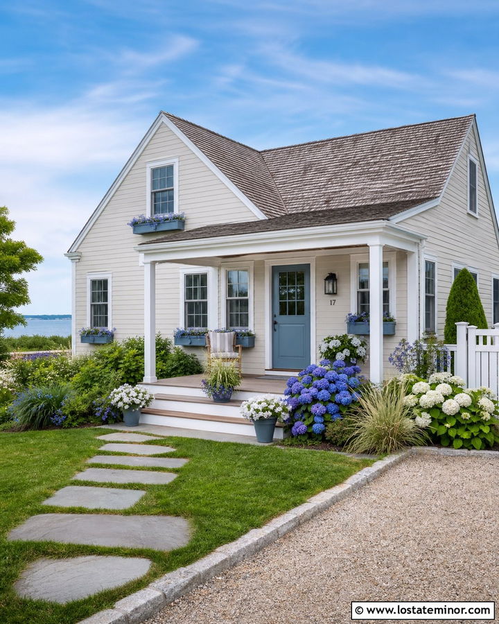 Coastal Greige Cottage With Blue Window Boxes - 30 Greige House Design With Window Boxes Ideas