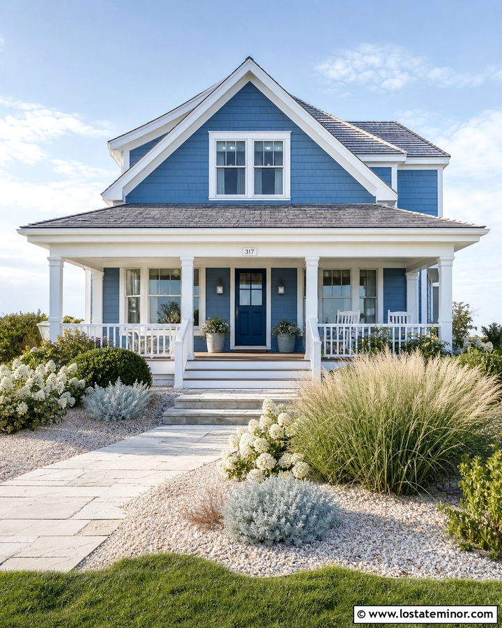 Denim Blue Coastal House With White Grasses And Blue Door - 30 Denim Blue House Design With Landscaping Ideas