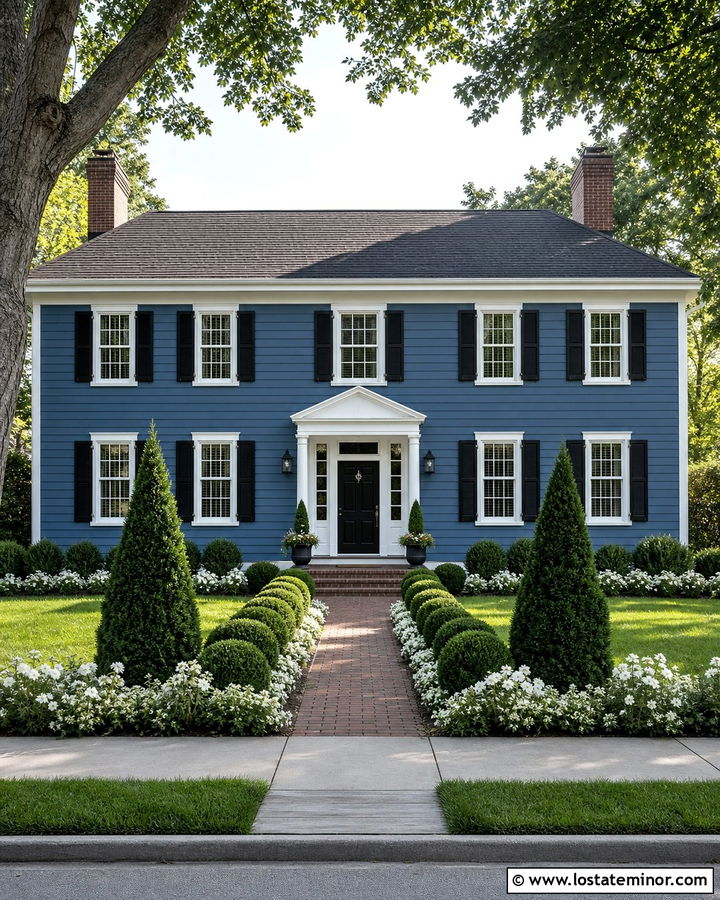 Denim Blue Colonial With Symmetrical Evergreen Landscaping - 30 Denim Blue House Design With Landscaping Ideas