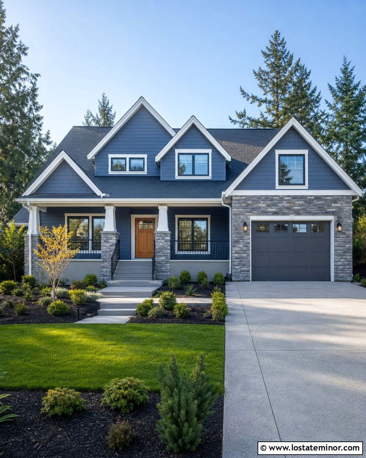 Denim Blue House With Stone Accent And Gray Deck - 30 Denim Blue House Design With Deck Ideas
