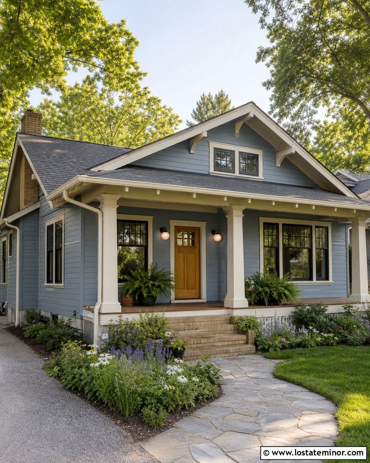 Dusty Blue Bungalow With Globe Sconces - 30 Dusty Blue House Design With Light Fixtures Ideas