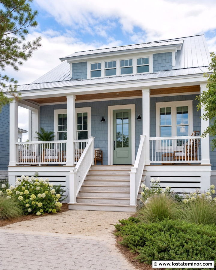 Dusty Blue Coastal House With White Railings - 30 Dusty Blue House Design With Railings Ideas