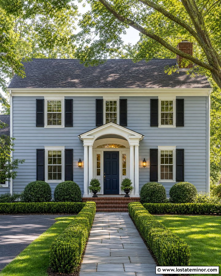 Dusty Blue Colonial With Brass Lanterns - 30 Dusty Blue House Design With Lighting Ideas