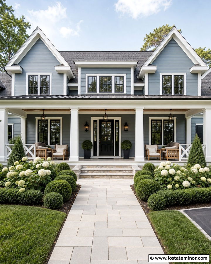 Dusty Blue House With A Black Front Door And White Columns - 30 Dusty Blue House Design With Porch Columns Ideas