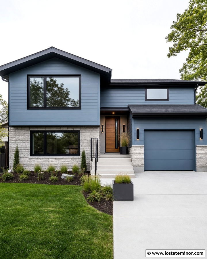 Dusty Blue Split Level With Cylinder Sconces - 30 Dusty Blue House Design With Light Fixtures Ideas