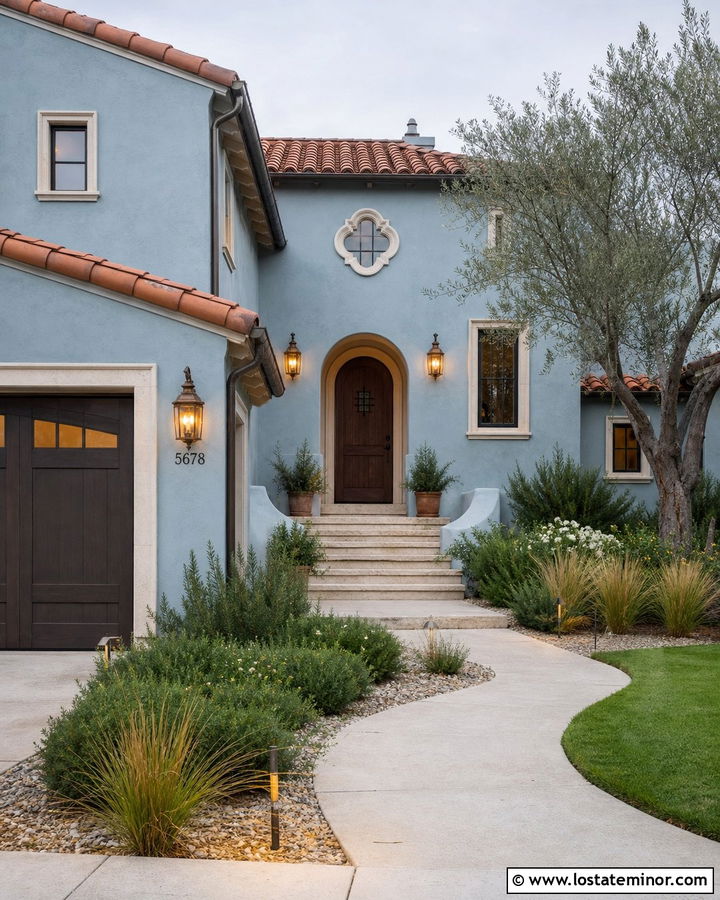 Dusty Blue Stucco House With Aged Brass Lights - 30 Dusty Blue House Design With Lighting Ideas