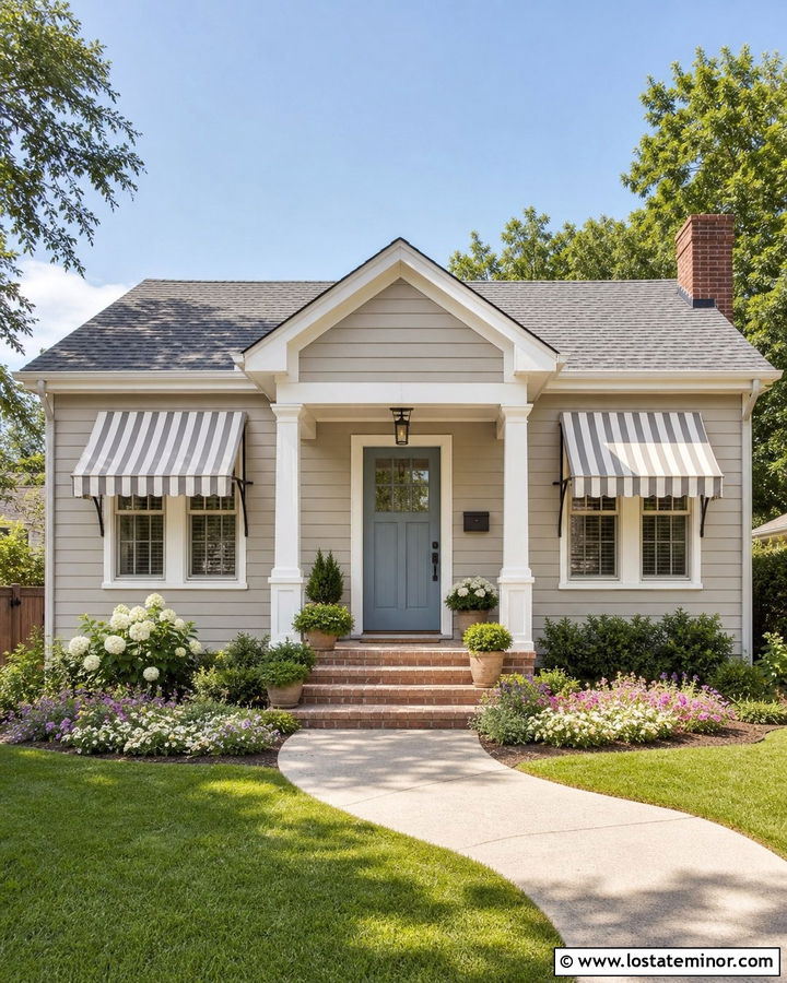 Greige Bungalow With Striped Window Awnings - 30 Greige House Design With Awning Ideas