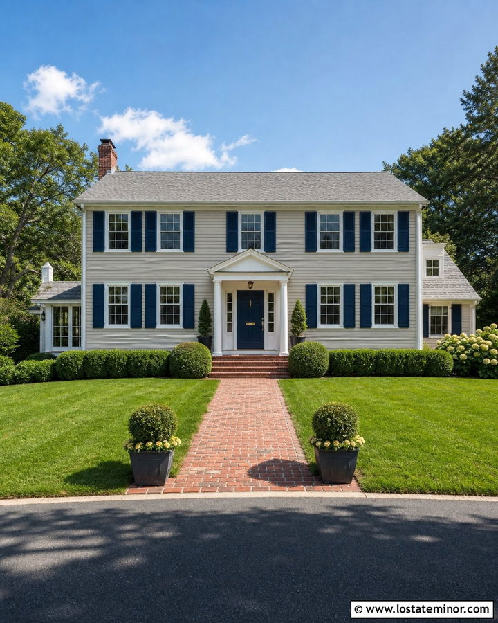 Greige Colonial With Navy Front Door - 30 Greige House Design With Entry Door Ideas