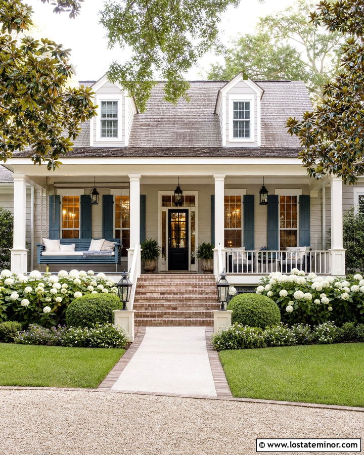 Greige Southern House With Blue Porch Swing - 30 Greige House Design With Swing Ideas