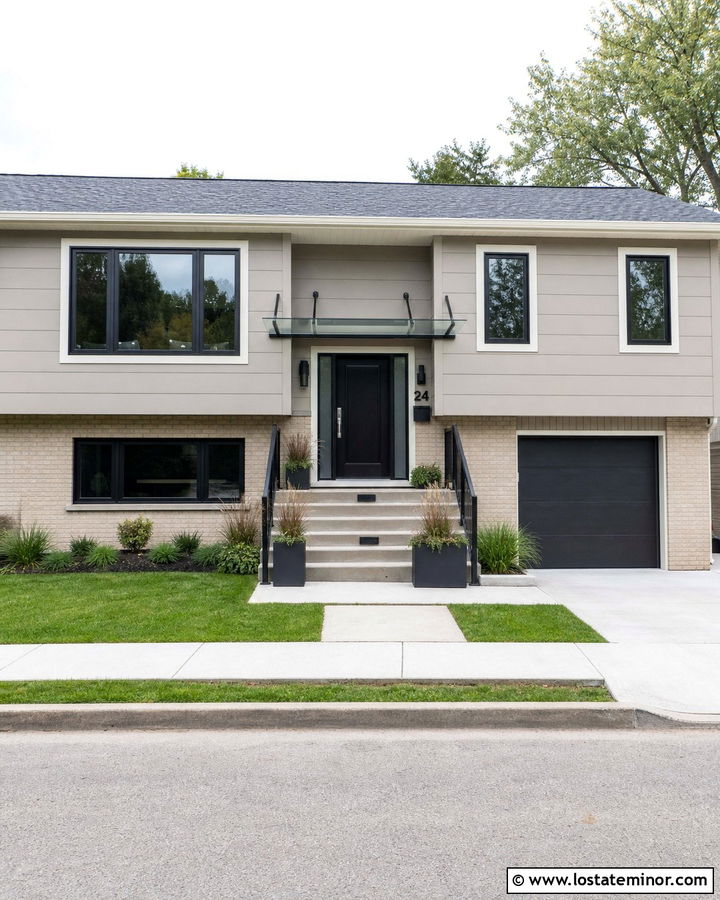 Greige Split Level With Glass Entry Awning - 30 Greige House Design With Awning Ideas