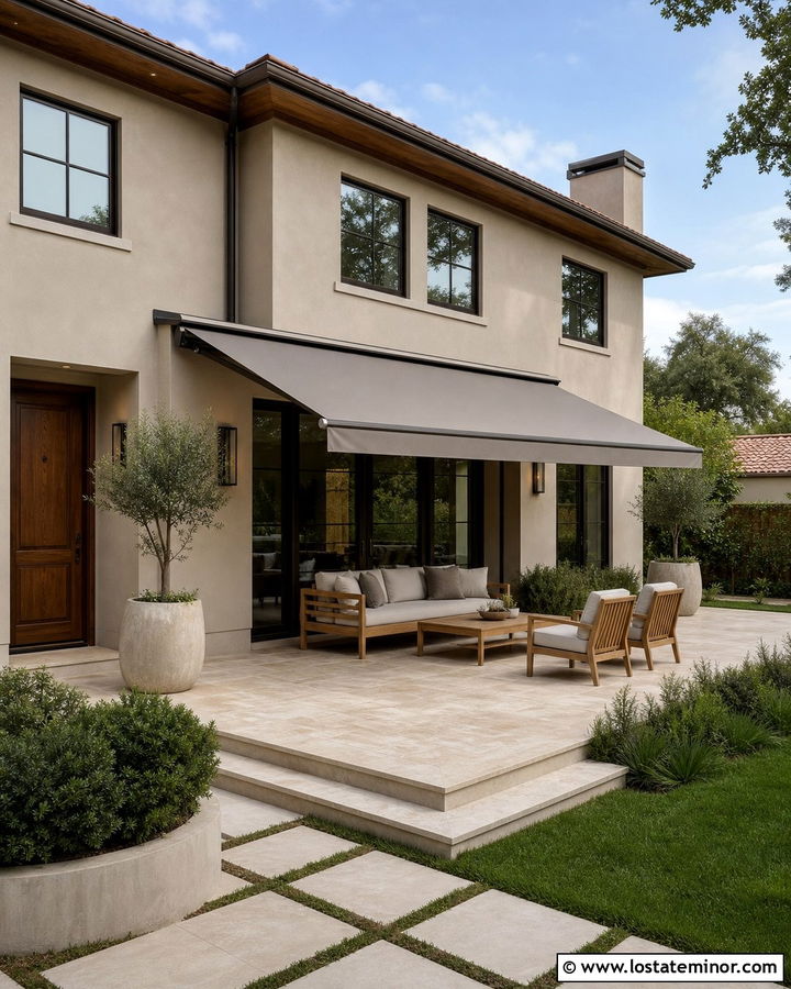 Greige Stucco House With Retractable Patio Awning - 30 Greige House Design With Awning Ideas