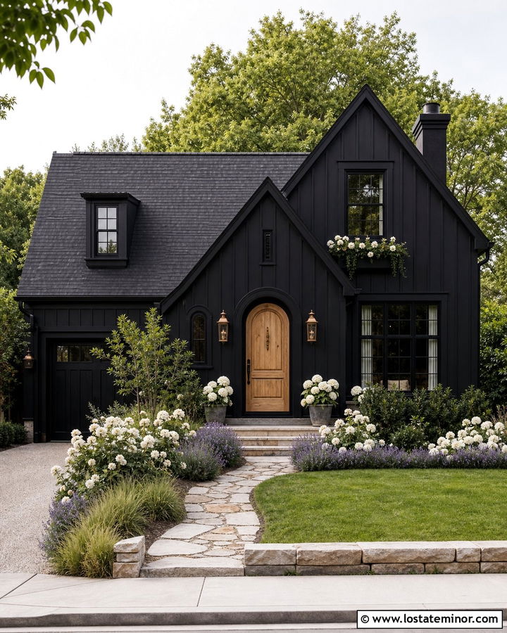 Jet Black Cottage With An Arched Wood Door - 30 Jet Black House Design With Board and Batten Ideas