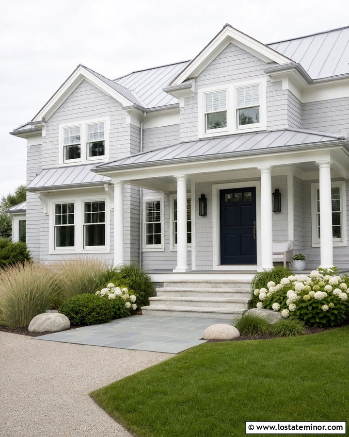 Light Gray Coastal House With Navy Door And Stone Steps - 30 Light Grey House Design With Steps Ideas