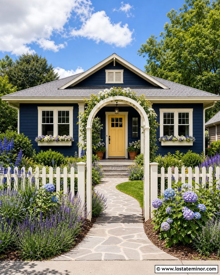 Navy Blue Bungalow With White Garden Fence - 30 Navy Blue House Design With Fence Ideas