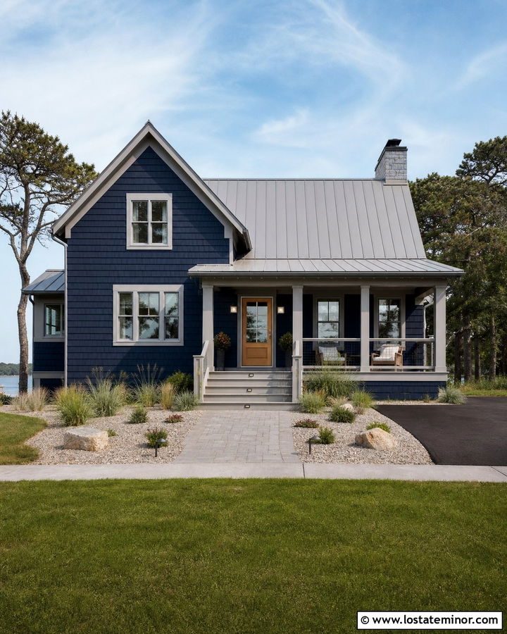 Navy Blue Coastal House With Gray Composite Railings - 30 Navy Blue House Design With Railings Ideas