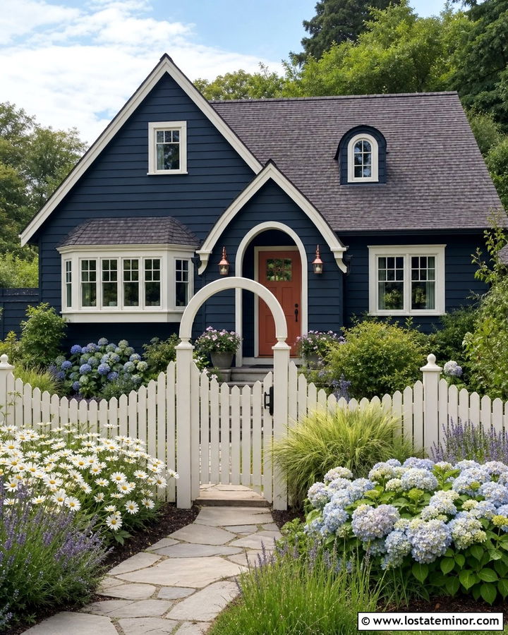 Navy Blue Cottage With Arched White Fence - 30 Navy Blue House Design With Fence Ideas