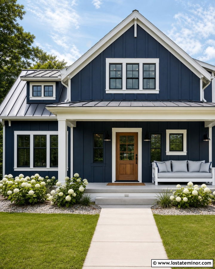 Navy Blue Farmhouse With White Porch Daybed - 30 Navy Blue House Design With Daybed Ideas