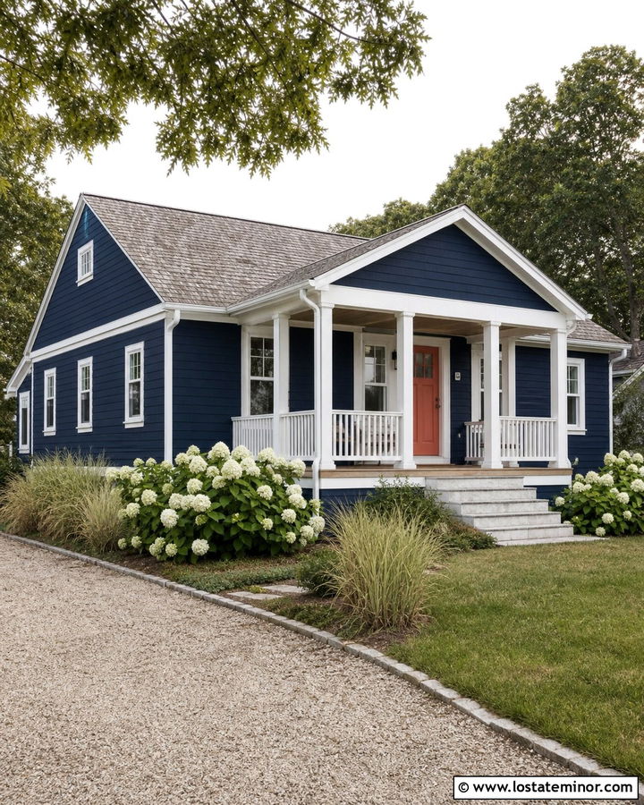 Navy Blue House With Coral Door And Soft White Trim - 30 Navy Blue House Design With Trim Ideas
