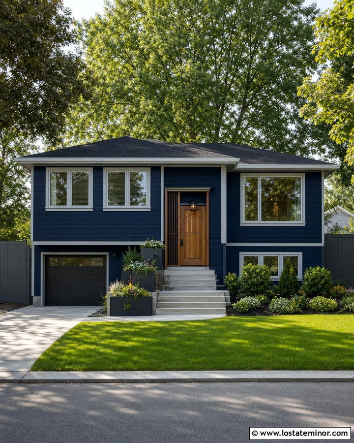 Navy Blue Split Level With Gray Privacy Fence - 30 Navy Blue House Design With Fence Ideas