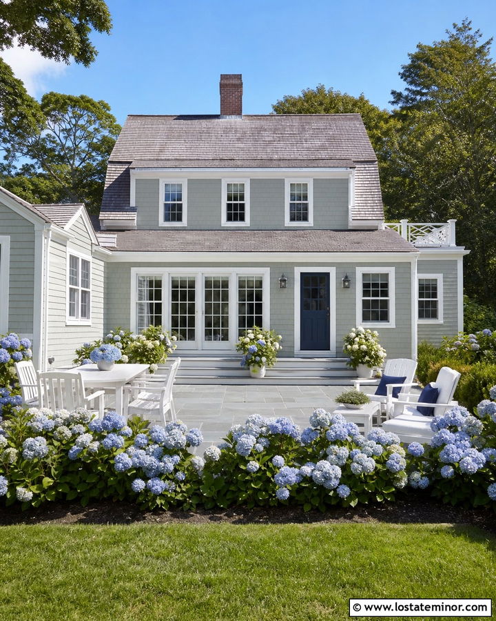 Sage Green Cape Cod House With Hydrangea Garden - 30 Sage Green House Design With Backyard Ideas