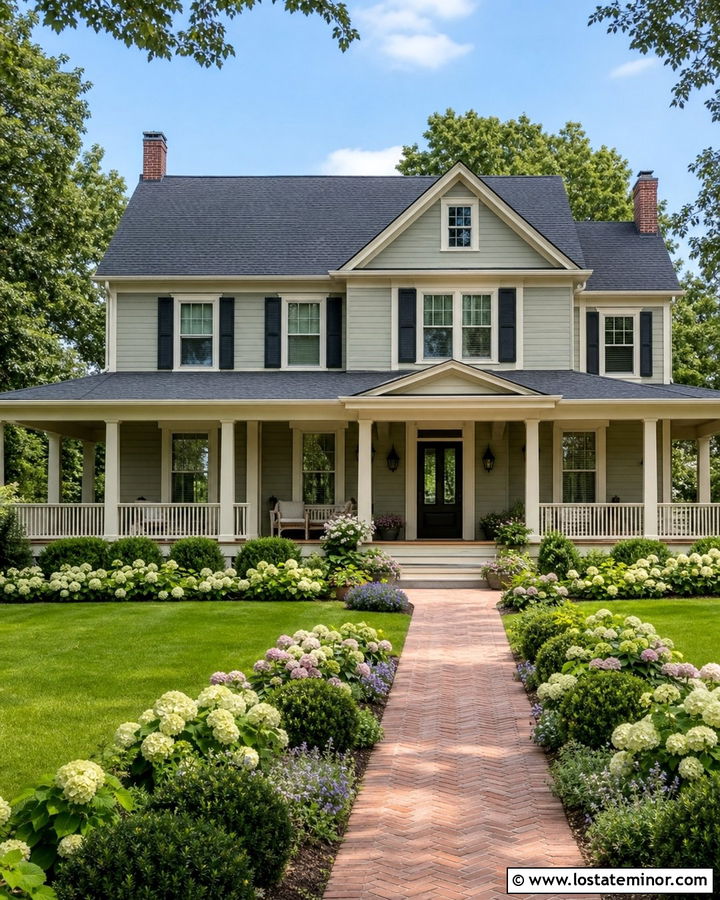 Sage Green House With Wraparound Porch And Layered Shrubs - 30 Sage Green House Design With Front Yard Ideas