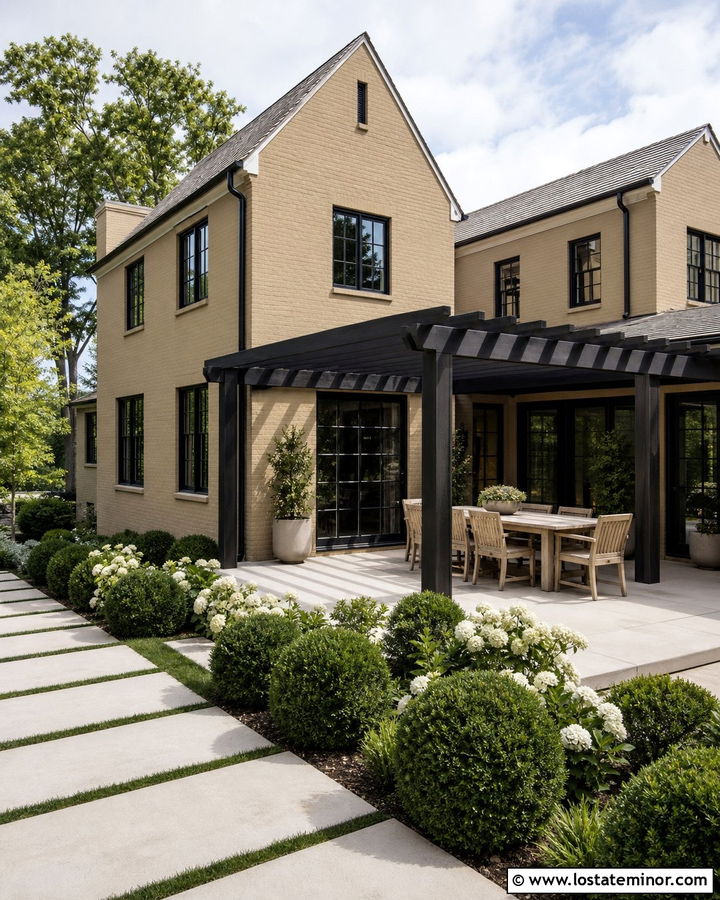 Sand Brick House With Black Pergola - 30 Sand House Design With Pergola Ideas