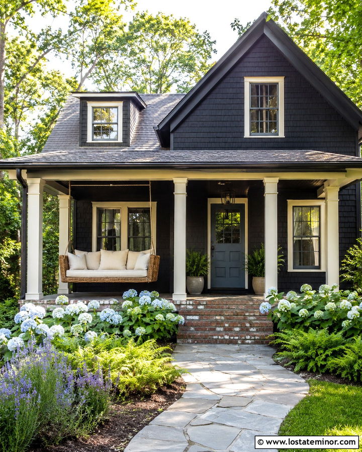 Soft Black Cottage With Wicker Porch Swing - 30 Soft Black House Design With Swing Ideas