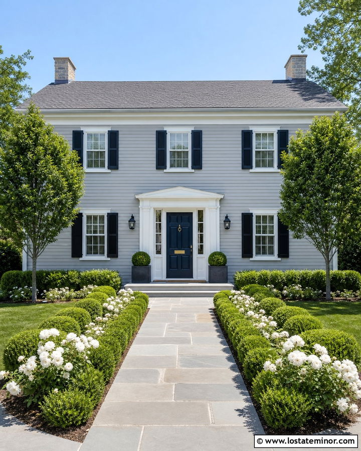 Stone Colonial House With Formal Boxwood Garden - 30 Stone House Design With Landscaping Ideas
