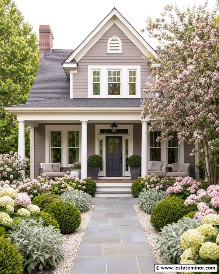 Taupe House With Pink Flowers And Soft Green Shrubs - 30 Taupe House Design With Landscaping Ideas