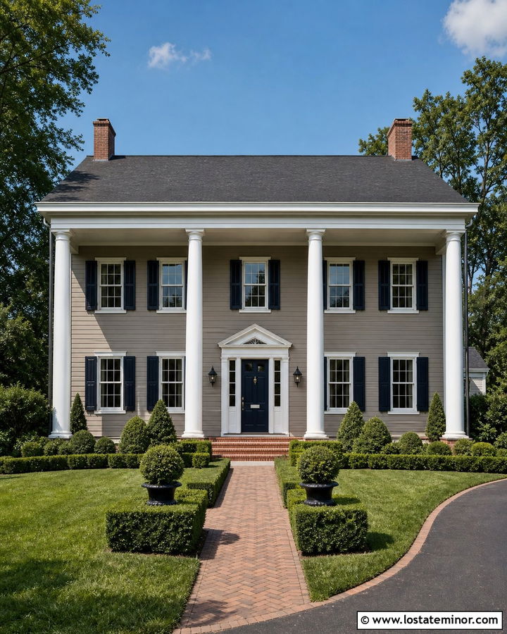 Taupe Tone Colonial With Round White Porch Columns - 30 Taupe House Design With Porch Columns Ideas