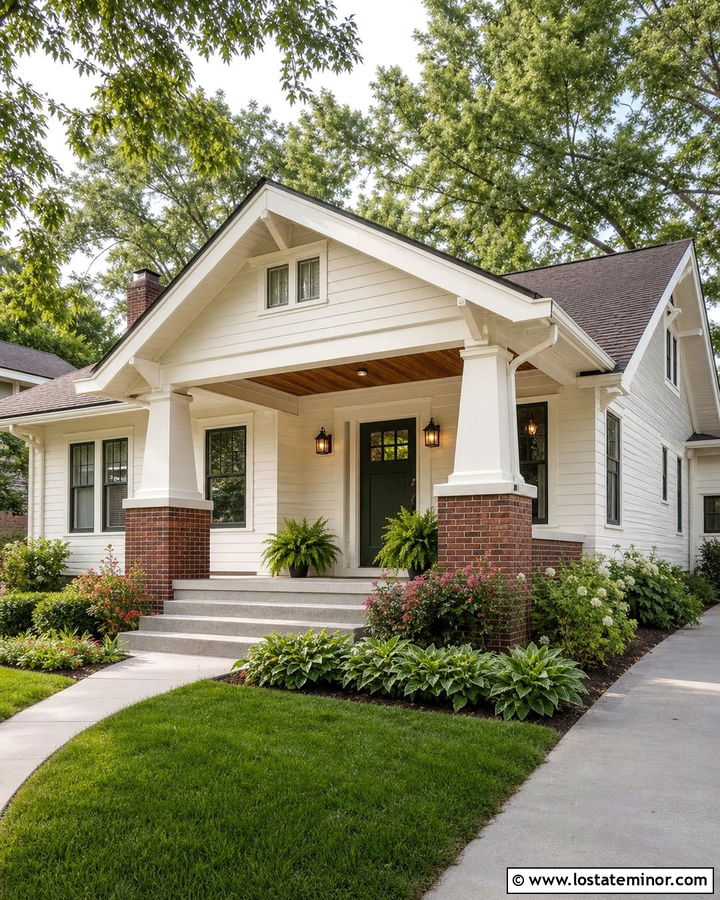 Warm White Bungalow With Brick Base Columns - 30 Warm White House Design With Porch Columns Ideas