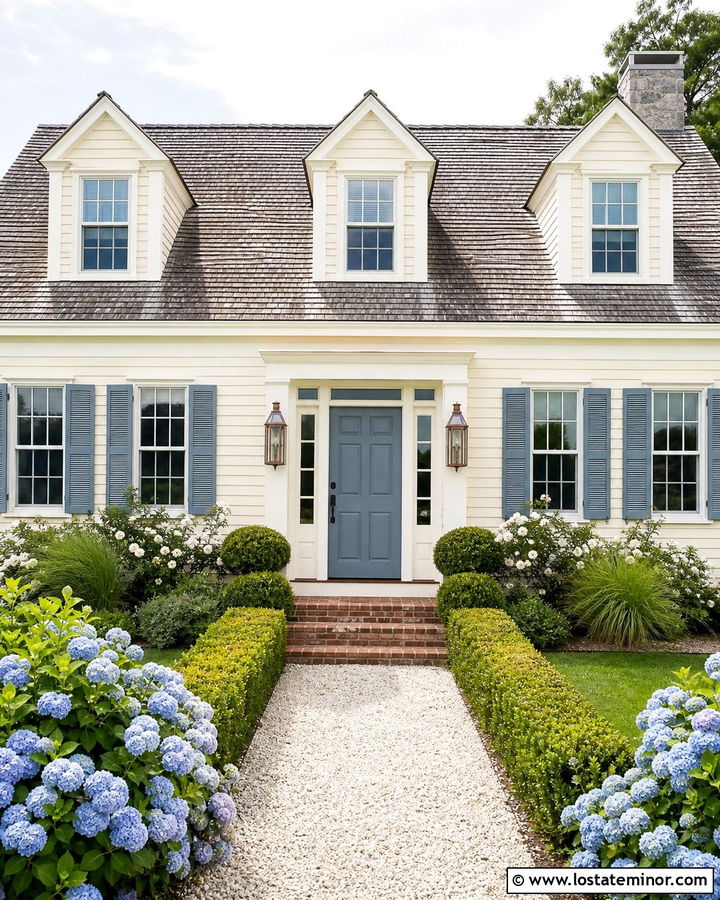 Warm White Cape Cod With Copper Lanterns - 30 Warm White House Design With Light Fixtures Ideas