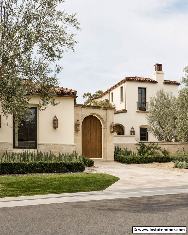 Warm White Courtyard House With Stone Arch - 30 Warm White House Design With Stone Accents Ideas