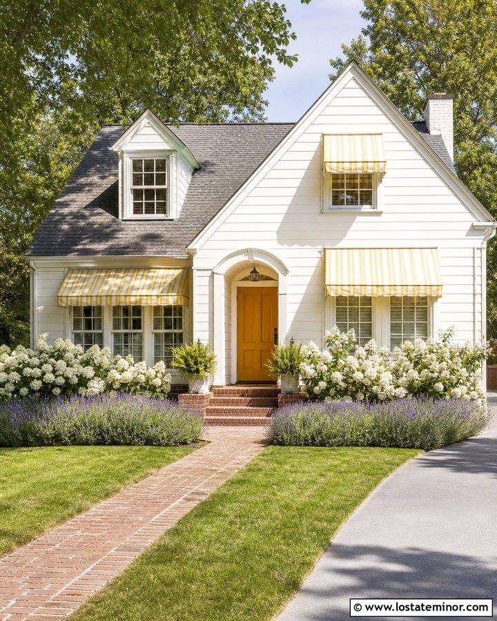 Warm White House With Yellow Striped Awning - 30 Warm White House Design With Awning Ideas