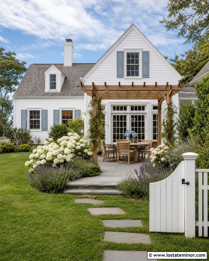 White Cape Cod House With Pergola Backyard Dining - 30 White House Design With Backyard Ideas