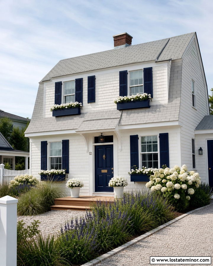 White Coastal House With Navy Window Boxes - 30 White House Design With Window Boxes Ideas