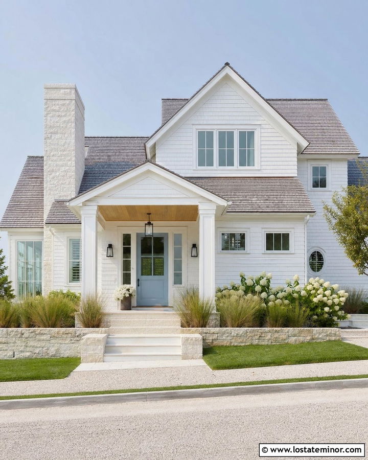 White Coastal House With Pale Stone - 30 White House Design With Stone Accents Ideas