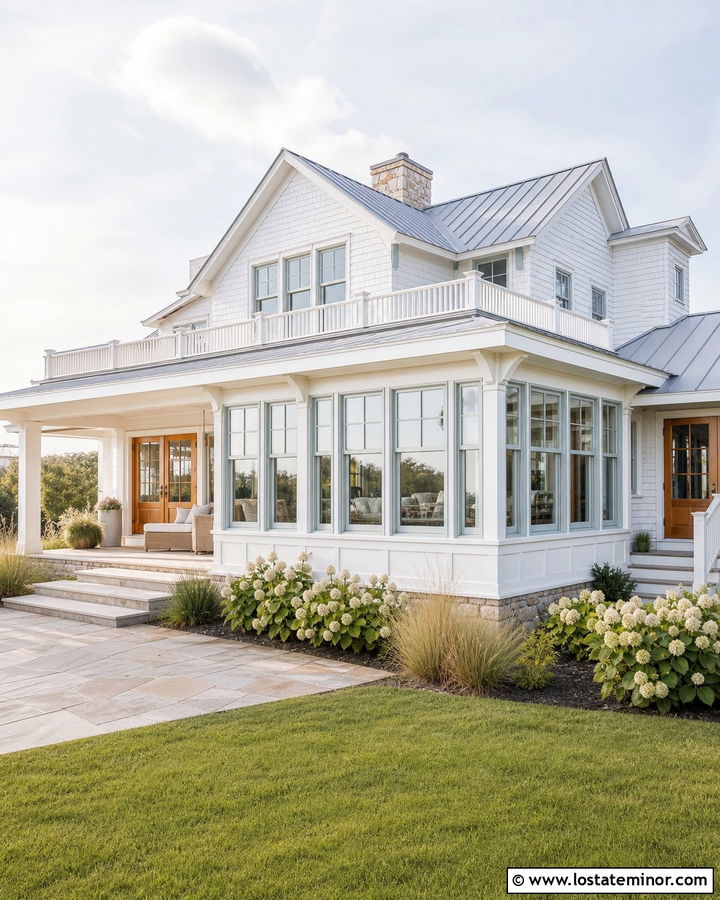 White Coastal House With Wraparound Sunroom - 30 White House Design With Sunroom Ideas