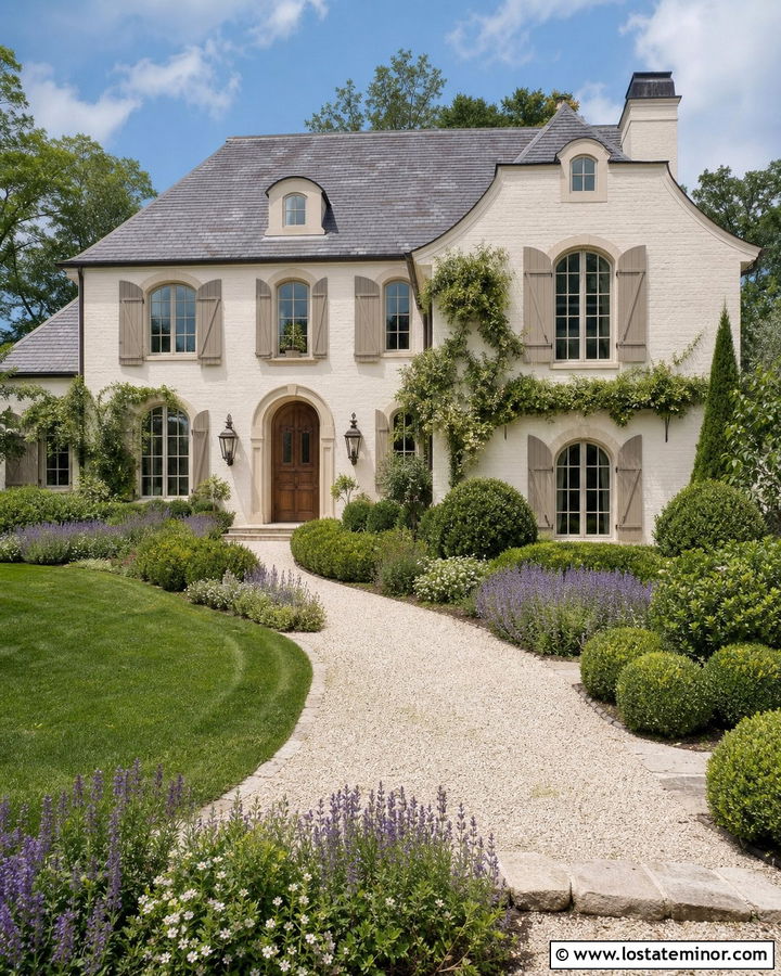 White French Country House With Bronze Lanterns - 30 White House Design With Light Fixtures Ideas