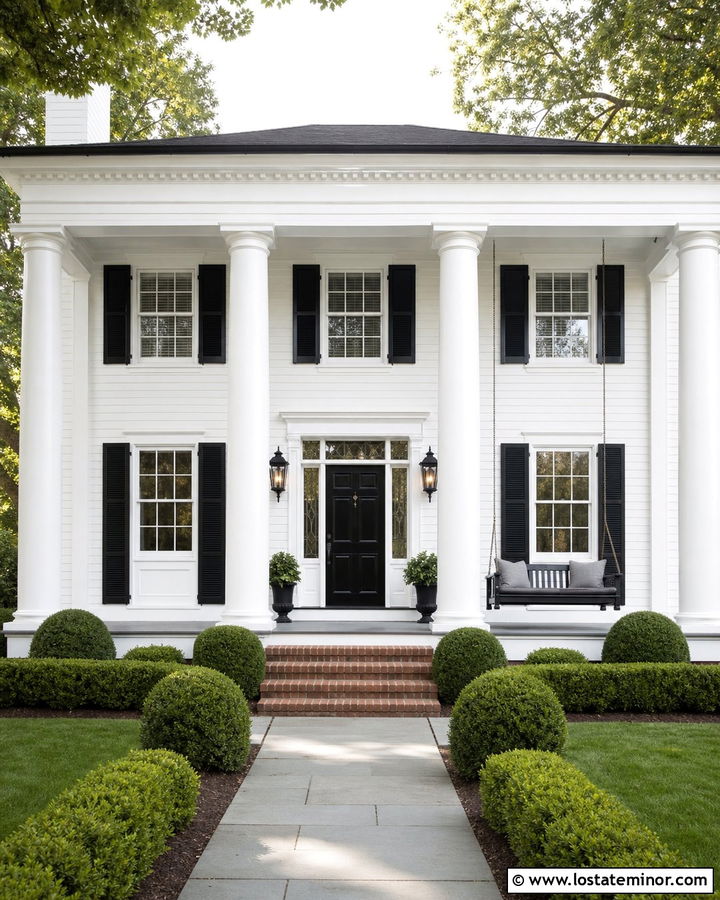 White Greek Revival House With Black Swing - 30 White House Design With Swing Ideas