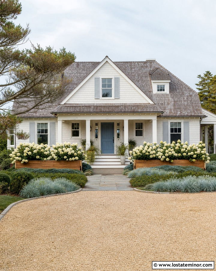 White House With Blue Door And Coastal Landscaping - 30 White House Design With Landscaping Ideas